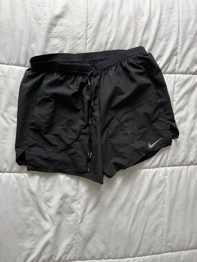 Nike Black Athletic Shorts with Reflective Swoosh